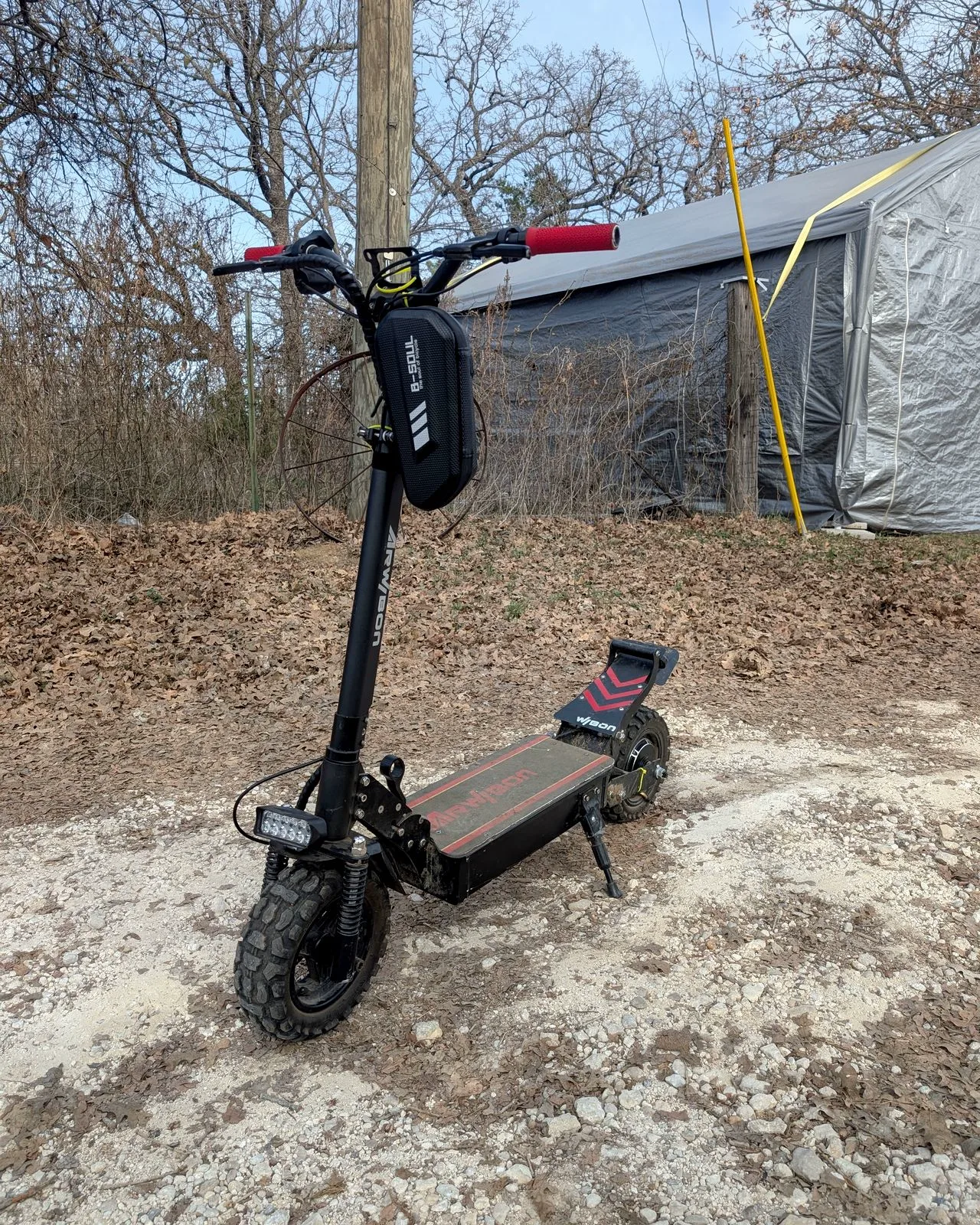 An off-road electric scooter outside my shop